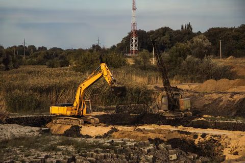 Excavators Overview With Industrial Machinery And Construction Knowledge
